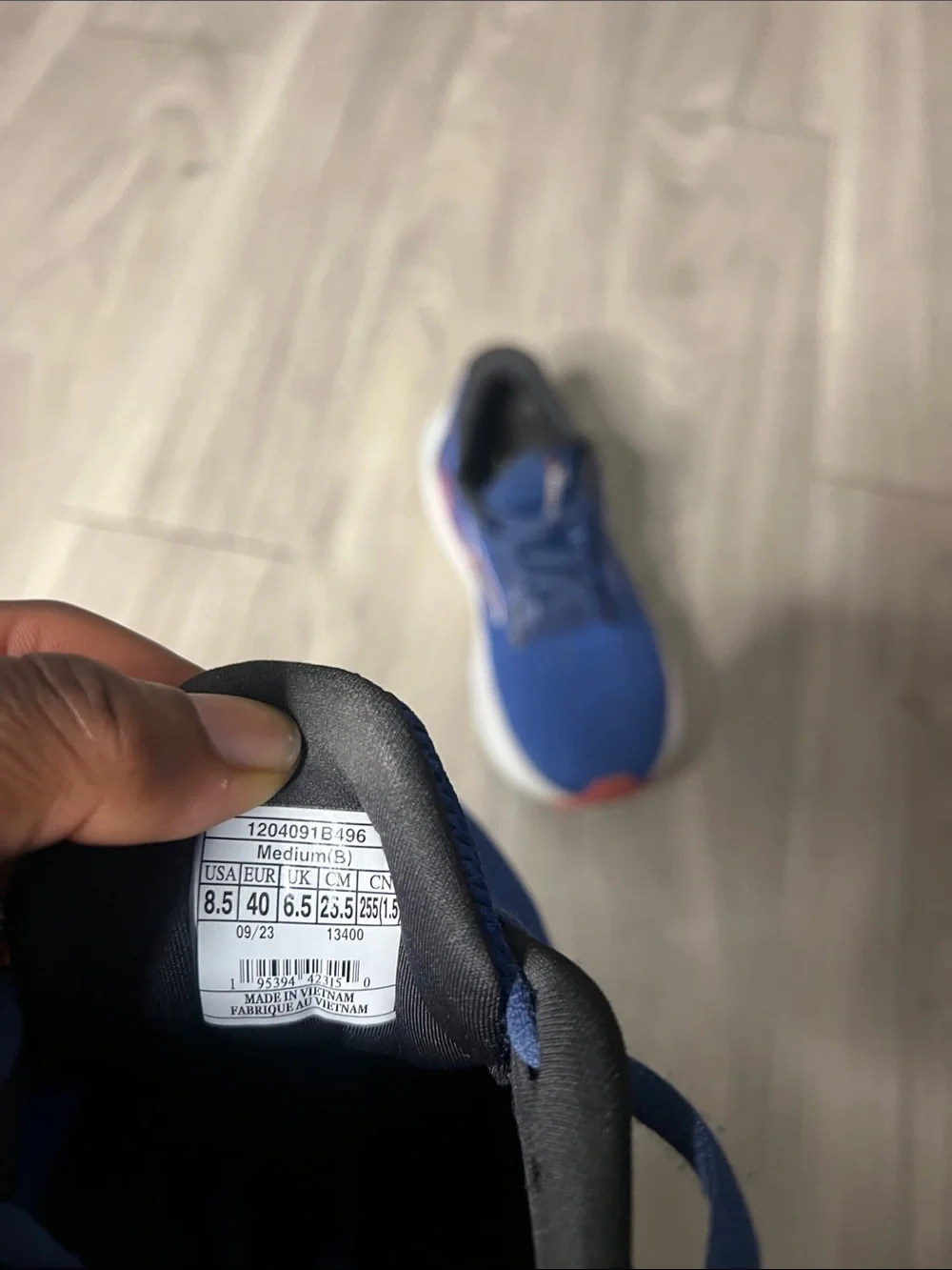 Brooks Women's Blue Running Shoes with Coral Accents